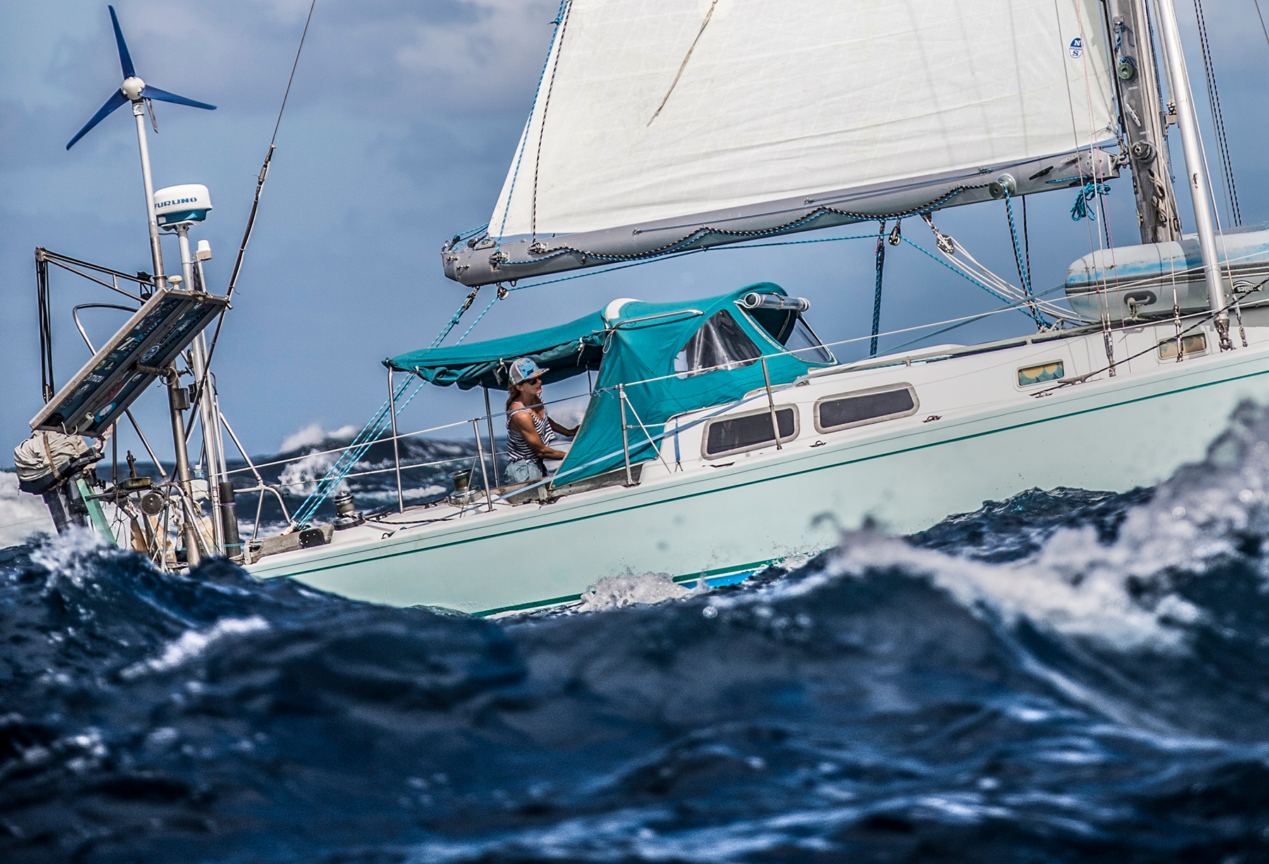 California, spent a decade sailing over 20,000 nautical miles on board her sailboat, Swell, exploring remote surf, learning from different cultures, living sustainably, and raising awareness about environmental issues. Photo credit: Jianca Lazarus