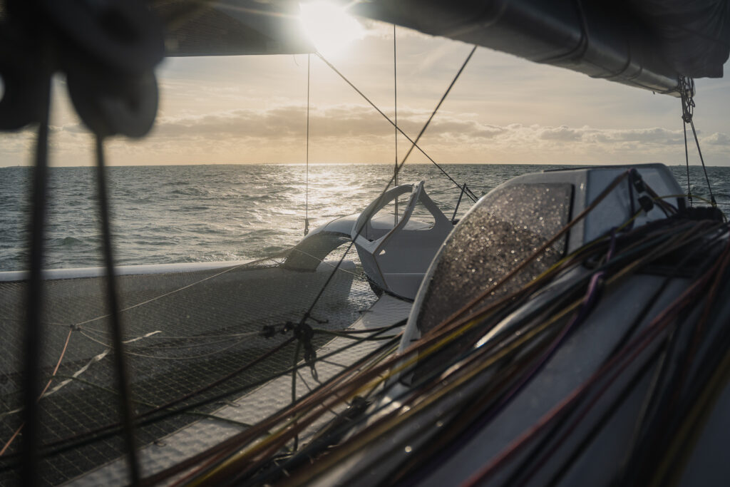 UpWind by MerConcept will empower the next generation of sailors worldwide to excel at sea through a global racing schedule on an Ocean Fifty high-performance trimaran. Applications are open until March 20, 2024, seeking passionate individuals committed to diversity, inclusion, and sustainable offshore excellence. Photo credit: Guillaume Gatefait